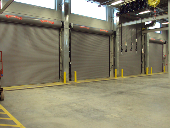 three large rolling overhead doors